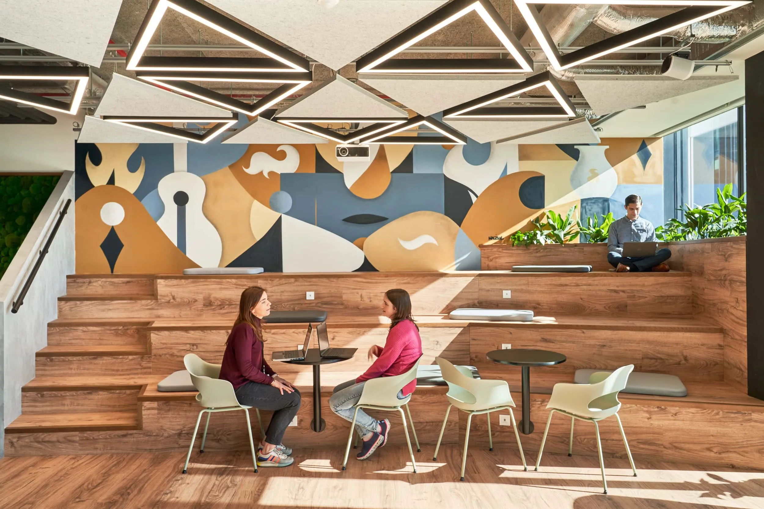 Open workspace corridor with soft daylight